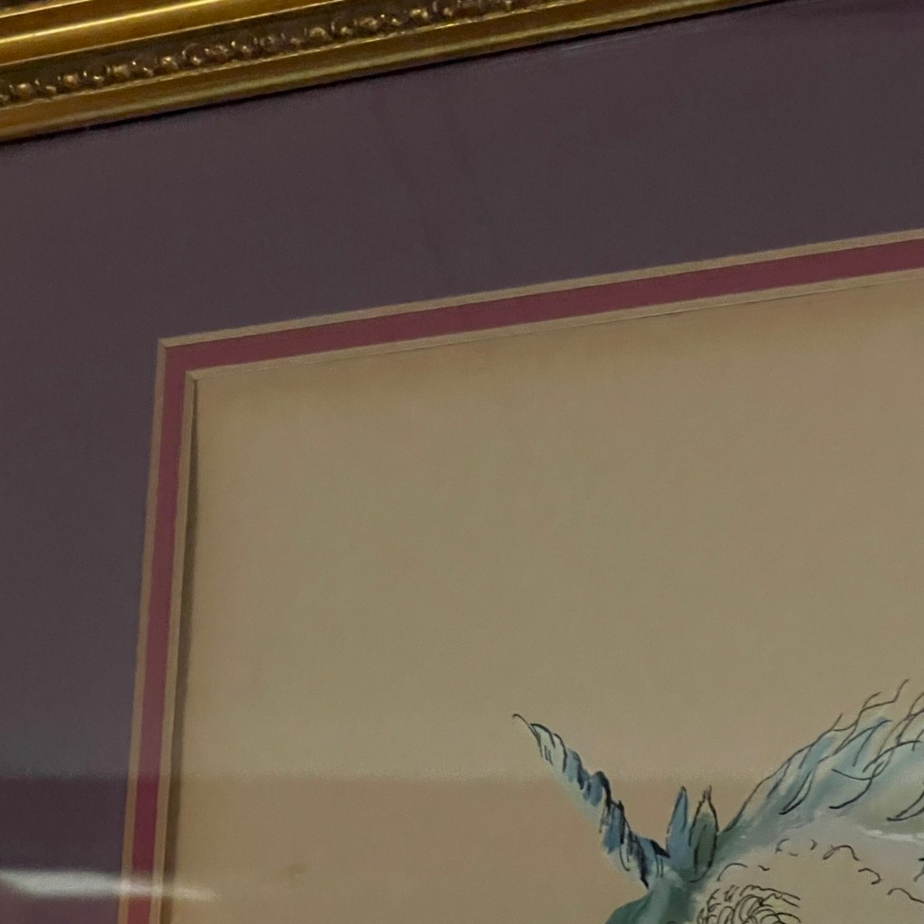 photo of a partial painting with a unicorn horn
